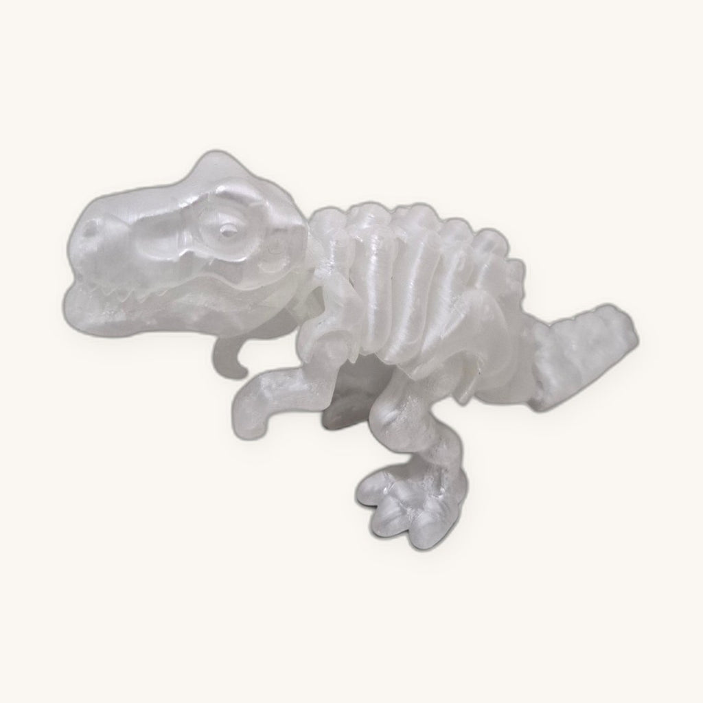 Dino T-Rex Brilha no Escuro de lado, cabeça grande, corpo e patas em placas articuladas
