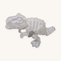 Dino T-Rex Brilha no Escuro de lado, cabeça grande, corpo e patas em placas articuladas