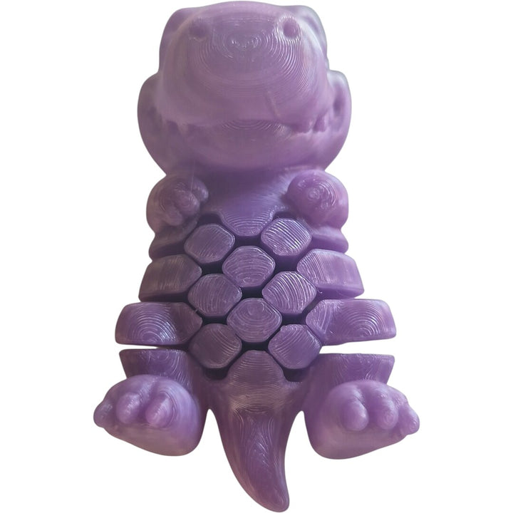 Dino Sense de frente, em pé nas duas patas, com o corpo em placas articuladas