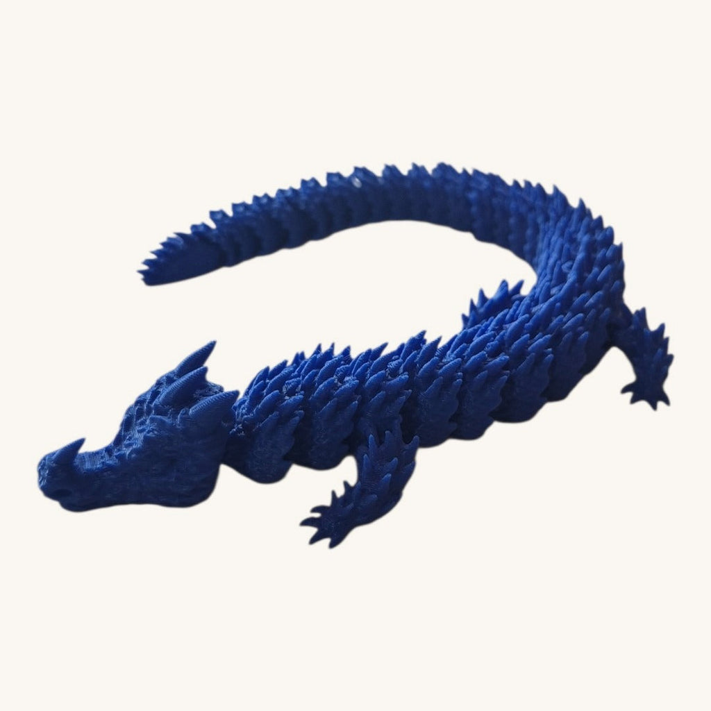 Dragão articulado deitado de perfil