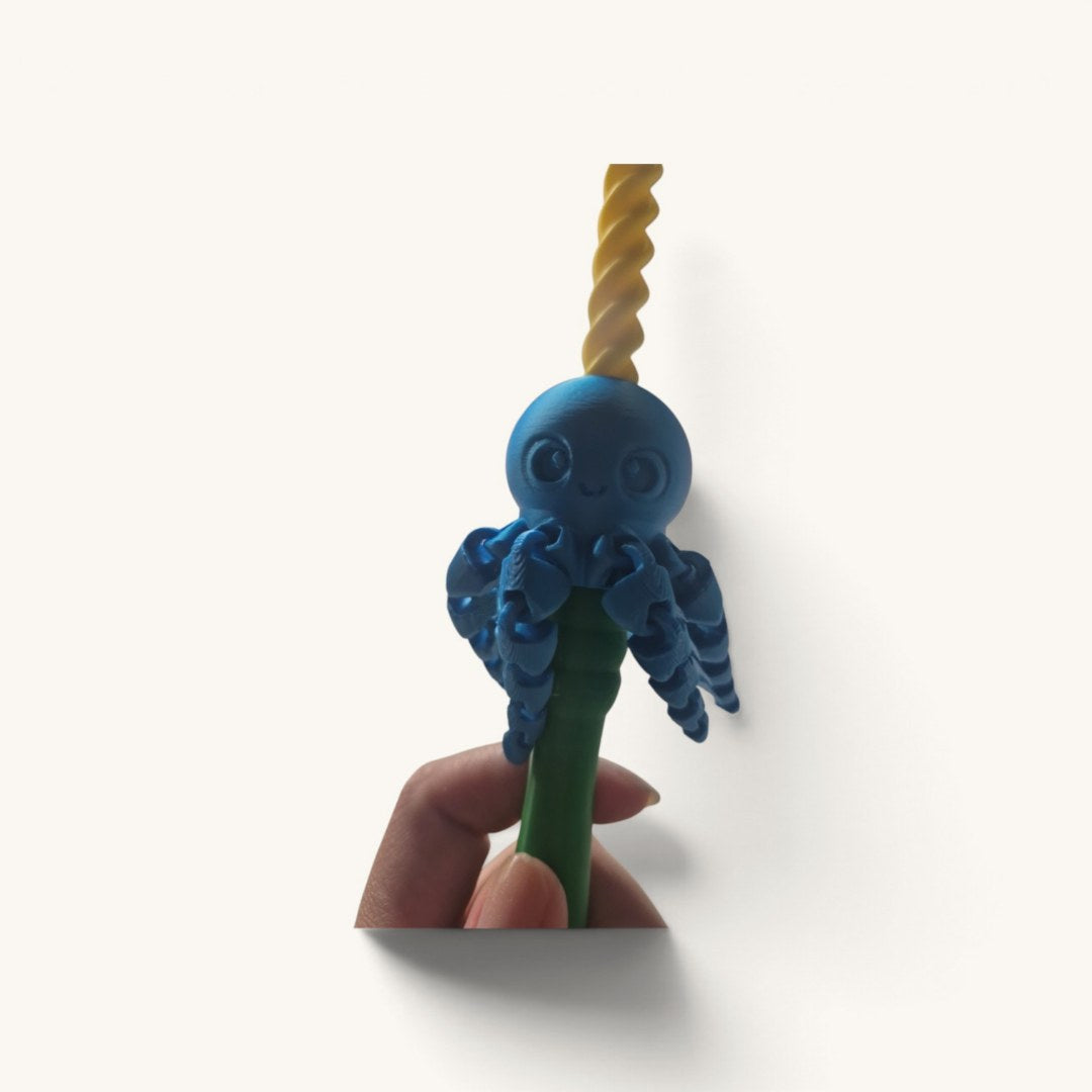 Detalhe do polvinho azul de tentáculos soltos na haste em espiral